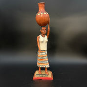 Woman Carrying Pot